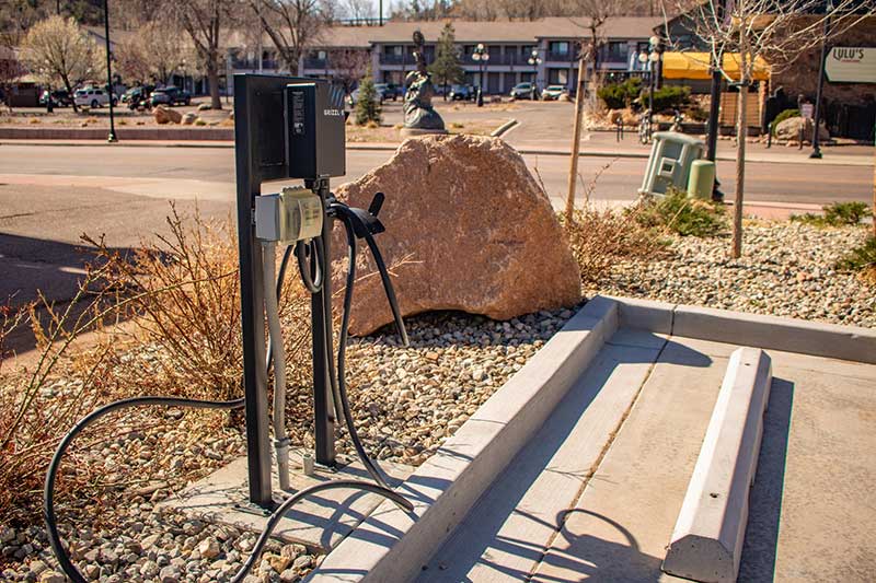 This photo shows the new EV Charging Station installed along the avenue. Manitou Springs Urban Renewal Authority Success Stories. This photo shows the new EV Charging Station installed along the avenue. Manitou Springs Urban Renewal Authority Success Stories.